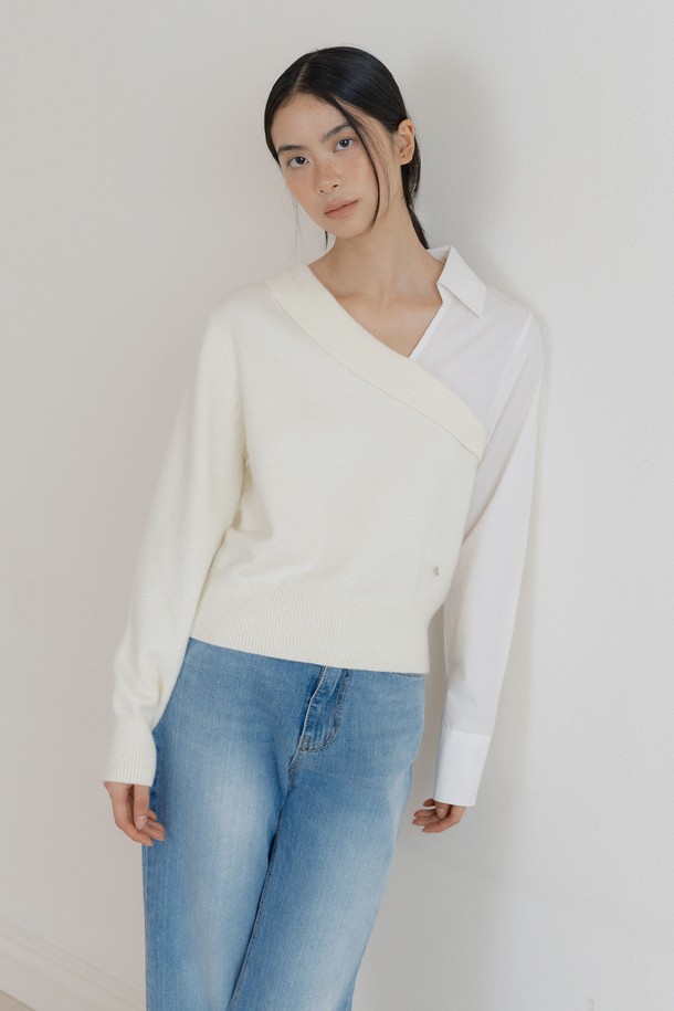 **Asymmetric Collar Knit (크림)**

비대칭 칼라 디자인이 돋보이는 여성 니트 스웨터입니다. 고급스러운 울 혼방 소재로 제작되어 부드러운 촉감과 두꺼운 두께감으로 따뜻하게 착용 가능합니다. 가을, 겨울 시즌 데이트룩 또는 데일리룩에 미니멀하고 시크한 스타일을 연출해보세요. 레귤러 핏으로 어떤 하의와도 잘 어울리며, 레이어드 디자인으로 다양한 스타일을 연출할 수 있습니다. 크림, 블랙 두 가지 컬러로 만나보세요.
