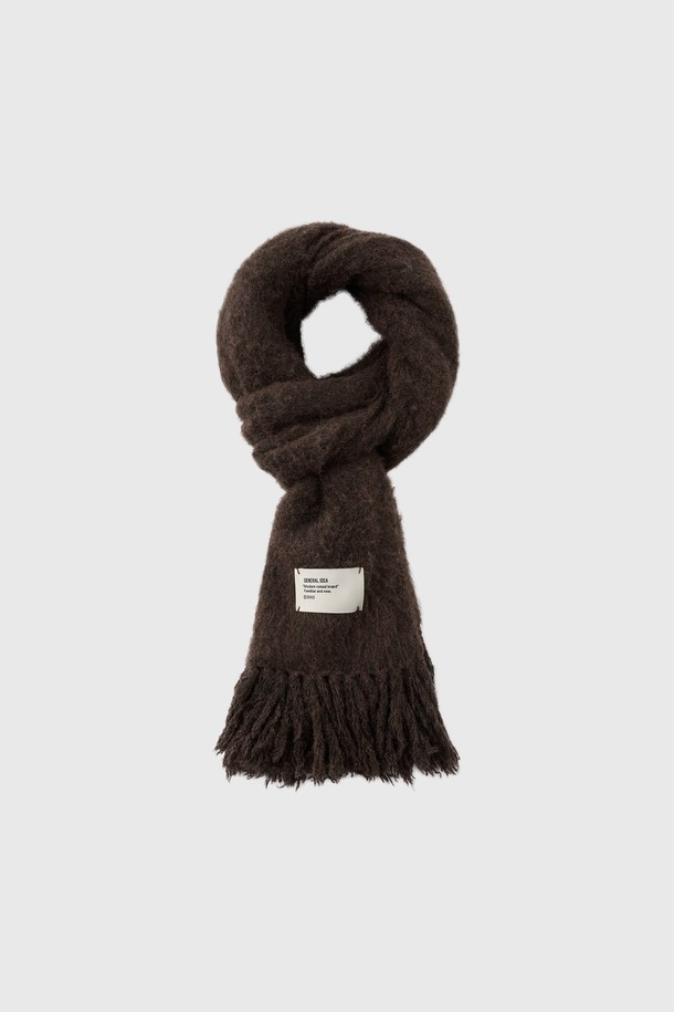 [25FW] UNISEX 헤어리 니트 머플러 [3COL]는 부드러운 촉감과 따뜻한 보온성을 제공하는 유니섹스 머플러입니다. 울과 아크릴 혼방 소재로 제작되어 가을, 겨울철 일상에서 캐주얼하게 착용하기 좋습니다. 헤어리 텍스처와 프린지 디테일이 돋보이며, 무지 디자인으로 다양한 스타일에 활용하기 용이합니다. 두꺼운 두께감으로 추운 날씨에도 따뜻하게 몸을 감싸주며, 편안한 착용감을 선사합니다. 브라운 컬러로 출시되어 따뜻하고 포근한 분위기를 연출합니다.
