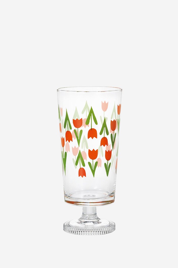 아데리아 텀블러 윗 스템 305ml - 튤립은 70-80년대 스타일의 프린트와 모던 레트로 디자인이 돋보이는 텀블러입니다. 305ml 용량으로, 튤립 플라워 패턴과 투명, 레드, 그린 색상의 조화가 빈티지 감성을 자아냅니다. 소다유리 소재로 제작되었으며, 스템 디자인과 스파클링 베이스가 특징입니다. 음료, 화병, 장식용으로 활용 가능하며, 크림소다나 파르페를 담기에도 적합합니다. 단, 전자레인지 및 식기세척기 사용은 불가합니다.
