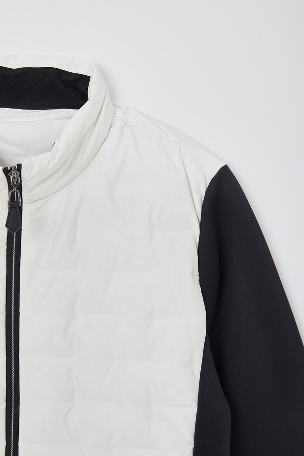 스포츠 네오프렌 다운 퀼팅 점퍼 CJP144는 겨울철 스포츠 활동과 일상에서 모두 활용 가능한 공용 아우터입니다. 보온성이 뛰어난 다운 충전재와 두꺼운 네오프렌 소재를 사용하여 추운 날씨에도 따뜻함을 유지해 줍니다. 스포티한 무드를 연출하는 크롭 기장의 레귤러핏 디자인으로, 등산, 러닝, 피트니스 등 다양한 TPO에 적합합니다. 화이트와 블랙 두 가지 색상으로 출시되어 미니멀하고 캐주얼한 스타일을 완성할 수 있습니다. 집업 스타일의 퀼팅 점퍼로 활동성을 높였습니다.
