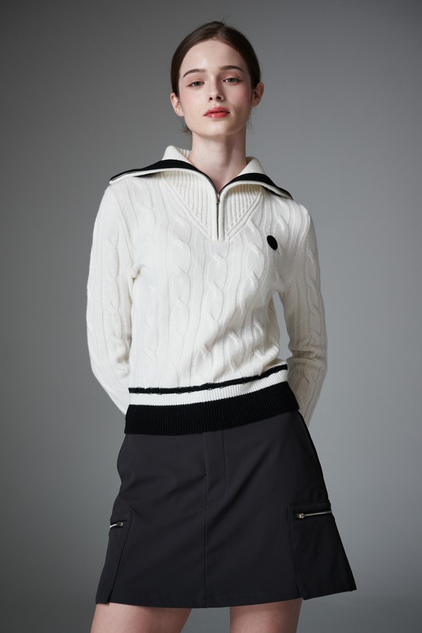 Keep warm A 라인 스커트 기모 A 라인 스커트는 여성 골프 및 일상용으로 적합한 겨울철 방한 스커트입니다. 부드러운 기모 안감과 두꺼운 두께로 보온성을 높였으며, A 라인 핏으로 편안한 착용감을 제공합니다. 블랙 컬러의 무지 디자인에 레귤러 핏으로 제작되었으며, 스포티하면서도 미니멀한 스타일을 연출합니다. 속바지가 포함되어 있어 활동적인 움직임에도 안정감을 더하며, 앞중심 오픈형 디자인으로 편리함을 더했습니다.
