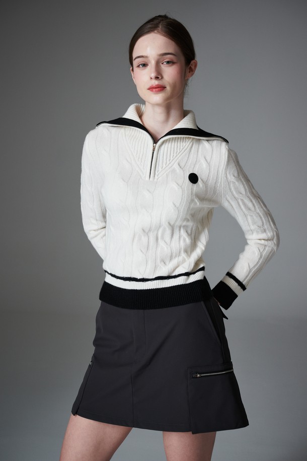 Keep warm A 라인 스커트 기모 A 라인 스커트는 여성 골프 및 일상용으로 적합한 겨울철 방한 스커트입니다. 부드러운 기모 안감과 두꺼운 두께로 보온성을 높였으며, A 라인 핏으로 편안한 착용감을 제공합니다. 블랙 컬러의 무지 디자인에 레귤러 핏으로 제작되었으며, 스포티하면서도 미니멀한 스타일을 연출합니다. 속바지가 포함되어 있어 활동적인 움직임에도 안정감을 더하며, 앞중심 오픈형 디자인으로 편리함을 더했습니다.
