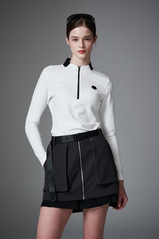 부드러운 플리스 소재의 여성 슬림 핏 집업 자켓입니다. 화이트와 블랙 두 가지 색상으로 제공되며, 가을과 겨울에 따뜻하게 착용할 수 있습니다. 네크라인에는 블랙 니트 배색이 포인트로 들어가 미니멀하면서도 스포티한 스타일을 연출합니다. 골프룩은 물론 일상에서도 편안하게 활용 가능하며, 두꺼운 두께감으로 보온성을 높였습니다. 긴 소매 기장의 무지 디자인으로 다양한 룩에 매치하기 좋습니다.
