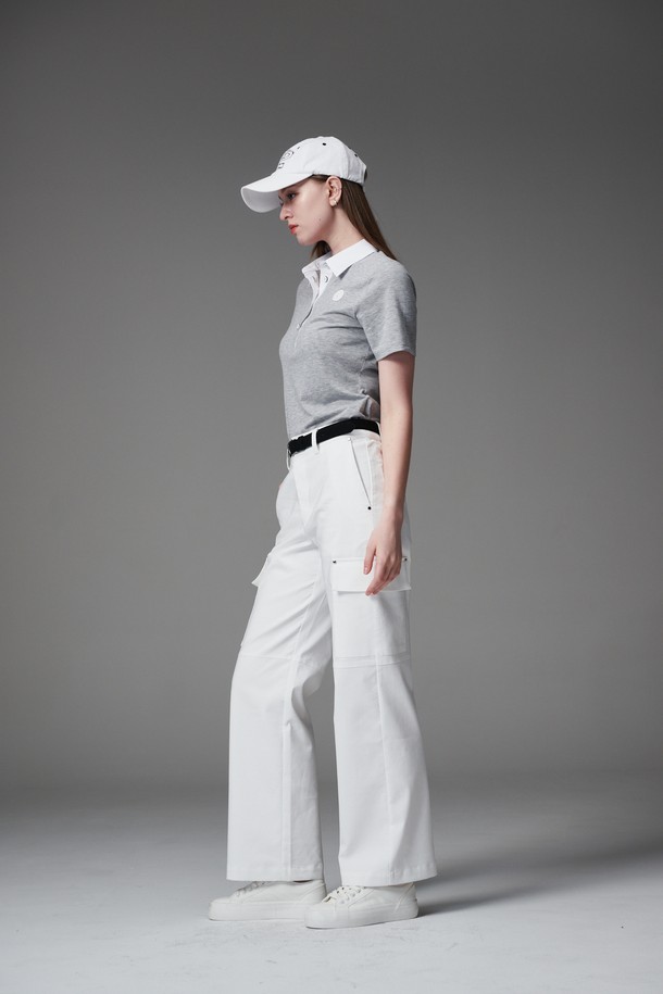 리벳 디테일 포켓 팬츠는 여성 골프룩과 일상복으로 활용 가능한 세미 와이드 팬츠입니다. 화이트 컬러의 무지 디자인으로, 캐주얼, 스포티, 미니멀 스타일을 연출할 수 있습니다. 면, 폴리에스터, 스판 혼방의 조직감 있는 원단으로 제작되어 편안한 착용감을 선사합니다. 금속 리벳 디테일과 카고 스타일의 포켓 디자인이 특징이며, 여름과 가을에 적합한 긴 기장의 바지입니다. 세미 와이드 핏으로 다리가 길어 보이는 효과를 줍니다.
