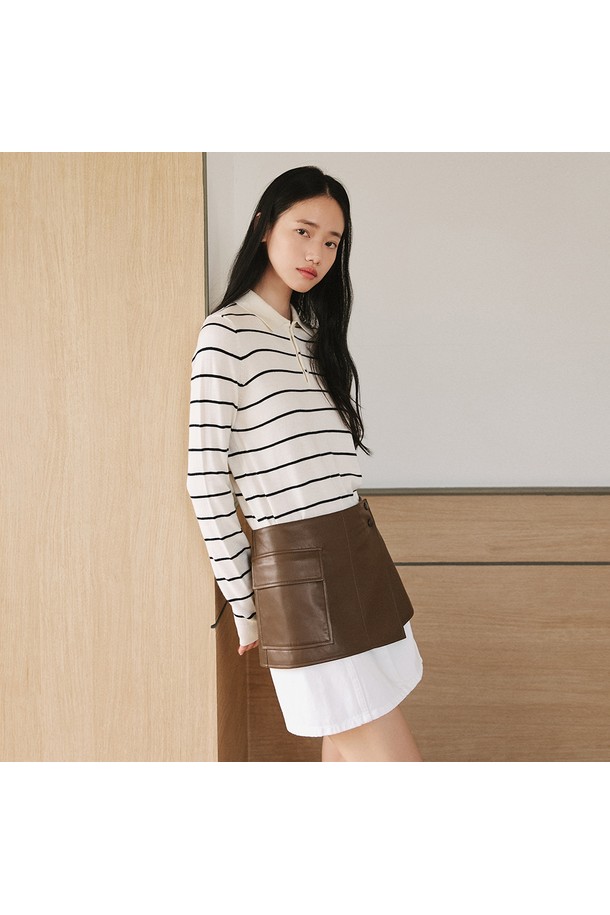 세련된 스타일을 완성해 줄 신세틱 레더 레이어드 스커트 [브라운]입니다. 미니멀한 디자인에 A라인 핏으로 다리 라인을 더욱 슬림하게 연출해 줍니다. 부드러운 폴리우레탄 소재와 자연스러운 광택이 고급스러운 분위기를 더하며, 포켓과 버튼 디테일로 포인트를 살렸습니다. 봄, 가을 시즌 데이트룩, 모임룩 등 다양한 TPO에 활용할 수 있는 아이템입니다. 미니멀, 클래식, 시크 스타일을 즐겨 입는 여성분들께 추천합니다.
