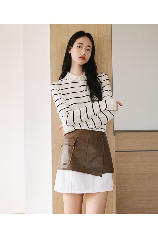 세련된 스타일을 완성해 줄 신세틱 레더 레이어드 스커트 [브라운]입니다. 미니멀한 디자인에 A라인 핏으로 다리 라인을 더욱 슬림하게 연출해 줍니다. 부드러운 폴리우레탄 소재와 자연스러운 광택이 고급스러운 분위기를 더하며, 포켓과 버튼 디테일로 포인트를 살렸습니다. 봄, 가을 시즌 데이트룩, 모임룩 등 다양한 TPO에 활용할 수 있는 아이템입니다. 미니멀, 클래식, 시크 스타일을 즐겨 입는 여성분들께 추천합니다.
