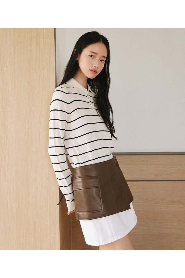 유니섹스 신세틱 크랙 레더 퀼팅 블루종 [브라운]은 가을, 겨울 시즌에 어울리는 캐주얼하고 베이직한 스타일의 아우터입니다. 부드러운 촉감의 폴리우레탄 소재로 제작되었으며, 퀼팅 디테일과 자연스러운 광택감이 특징입니다. 레귤러 핏으로 제작되었으며, 넉넉한 두께감으로 보온성을 높였습니다. 크랙 패턴과 스냅 버튼 클로저, 긴 소매 디자인으로 다양한 겨울 데일리룩에 활용하기 좋습니다. 사이드 포켓이 있어 실용성을 더했습니다.
