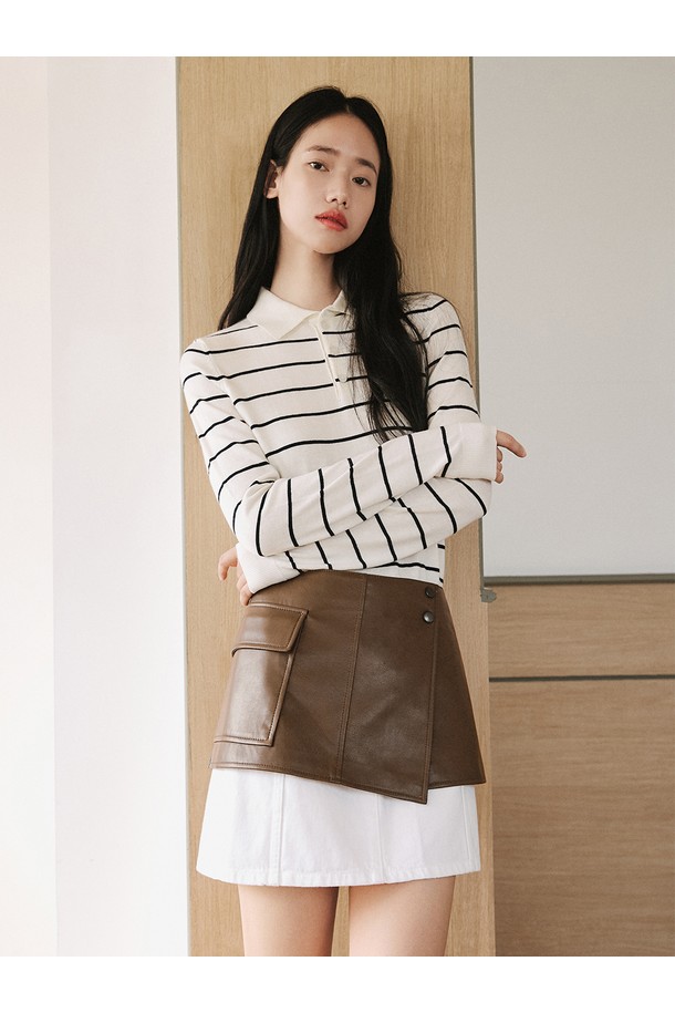 세련된 스타일을 완성해 줄 신세틱 레더 레이어드 스커트 [브라운]입니다. 미니멀한 디자인에 A라인 핏으로 다리 라인을 더욱 슬림하게 연출해 줍니다. 부드러운 폴리우레탄 소재와 자연스러운 광택이 고급스러운 분위기를 더하며, 포켓과 버튼 디테일로 포인트를 살렸습니다. 봄, 가을 시즌 데이트룩, 모임룩 등 다양한 TPO에 활용할 수 있는 아이템입니다. 미니멀, 클래식, 시크 스타일을 즐겨 입는 여성분들께 추천합니다.
