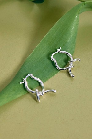 Walking human earring Silver