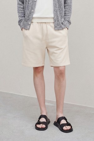 레오 드로스트링 쇼츠 크림