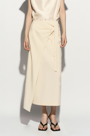 ASYMMETRIC HEM SIDE TIE SKIRT