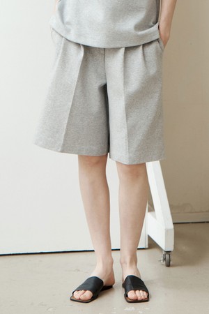 터크 와이드 쿠션 하프 팬츠