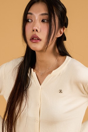 브이넥 에어리 니켈 로고 니트 가디건 [아이보리] KCL.