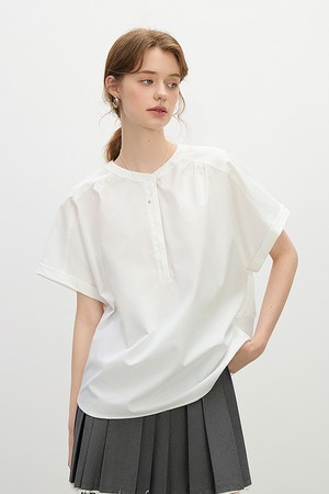 Back ribbon button blouse