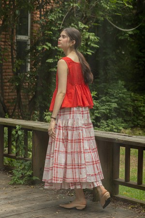 Red check pleated skirt