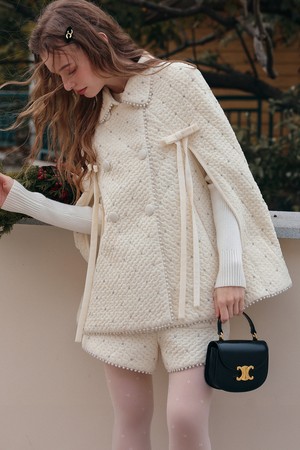Elegant quilted cape coat
