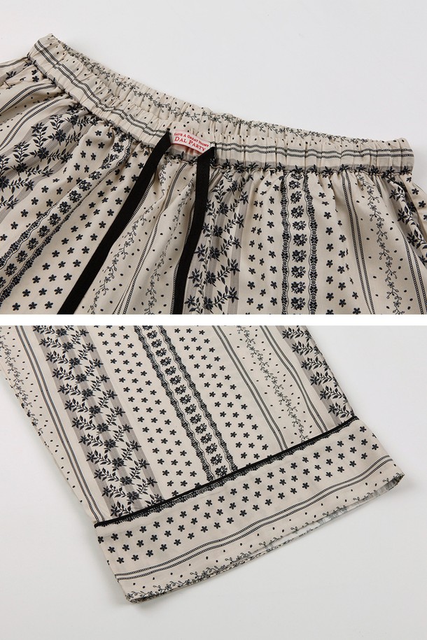 달파티 젠틀판도라 파자마 세트는 부드러운 면 소재로 제작되어 편안한 착용감을 선사합니다. 화이트와 그레이 색상의 스트라이프 또는 기하학 패턴 디자인으로 미니멀, 캐주얼, 클래식 스타일을 연출합니다. 반소매, 카라넥, 버튼다운 상의와 하의 세트로 구성되어 있으며, 집콕룩으로 활용하기 좋습니다. 사계절 내내 활용 가능한 실내복 또는 수면용 파자마 세트로, 편안한 휴식을 취할 수 있도록 디자인되었습니다.
