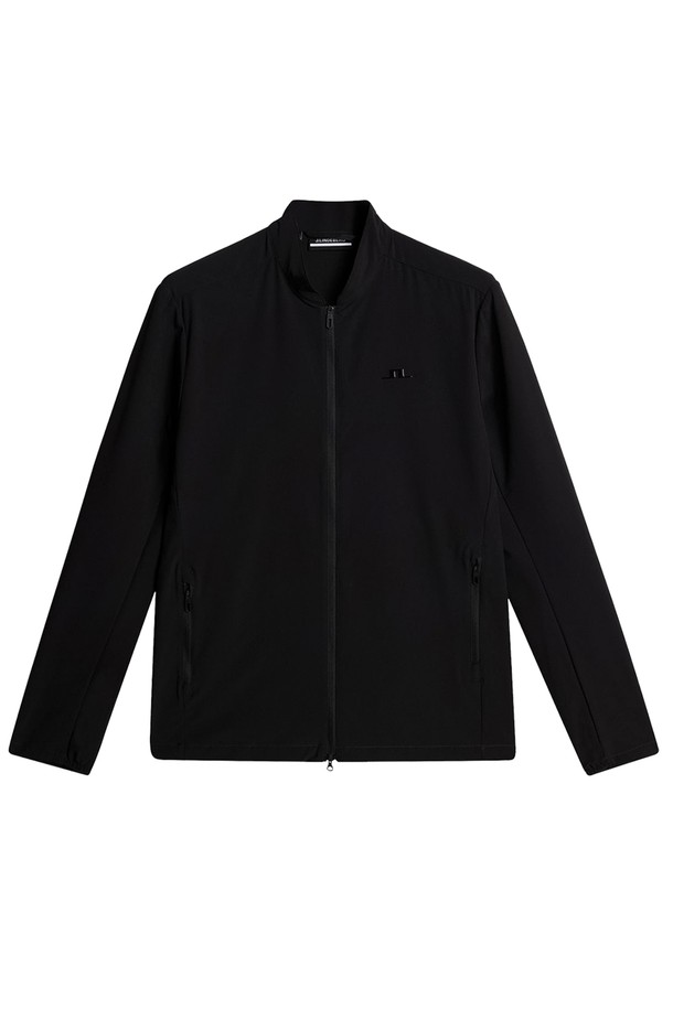 제이린드버그 남성골프웨어 FW25 KV 하이브리드 골프 재킷 블랙 GMOW13592는 가을, 겨울 시즌 골프를 즐기는 남성을 위한 기능성 아우터입니다. 스포티한 스타일의 이 재킷은 나일론 소재로 제작되어 부드러운 촉감과 두꺼운 두께로 보온성을 제공하며 방풍 기능까지 갖췄습니다. 레귤러핏으로 편안한 착용감을 선사하며, 무지 디자인과 블랙 컬러는 미니멀한 스타일을 연출합니다. 집업 스타일과 긴 소매, 하이브리드 코트 타입으로 디자인되어 골프룩에 적합합니다.
