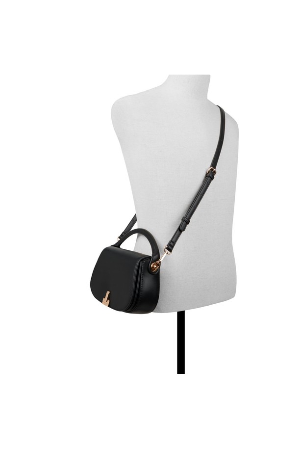 윌라마이 크로스 바디 - 블랙 ADD1H054HZ001는 여성용으로, 데이트룩, 모임룩, 오피스룩에 잘 어울리는 스타일의 크로스백입니다. 유행을 타지 않는 클래식, 미니멀, 시크한 디자인이 특징이며, 부드러운 폴리우레탄 소재로 제작되었습니다. 가방의 크기는 스몰 사이즈이며, 무지 패턴에 버클 장식이 포인트로 더해져 세련된 느낌을 줍니다. 반원 형태의 가방 모양에 탑핸들이 있어, 다양한 스타일로 연출할 수 있습니다. 버클형 잠금방식으로 내용물을 안전하게 보관할 수 있습니다.
