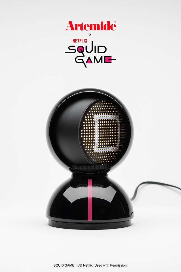 [Artemide] 오징어게임 에클리세 테이블 프론트맨은 넷플릭스(Netflix) 공식 라이센스 제품으로, 오징어 게임을 모티브로 한 한정판 조명입니다. 블랙 컬러의 스틸과 테크노폴리머 소재로 제작되었으며, 180mm x 120mm 사이즈입니다. 프론트맨 디자인이 특징이며, 제품 결함에 대해 7년 보증을 제공합니다. 테이블 조명 본체로 구성되어 있으며, 조명 기능을 제공합니다.
