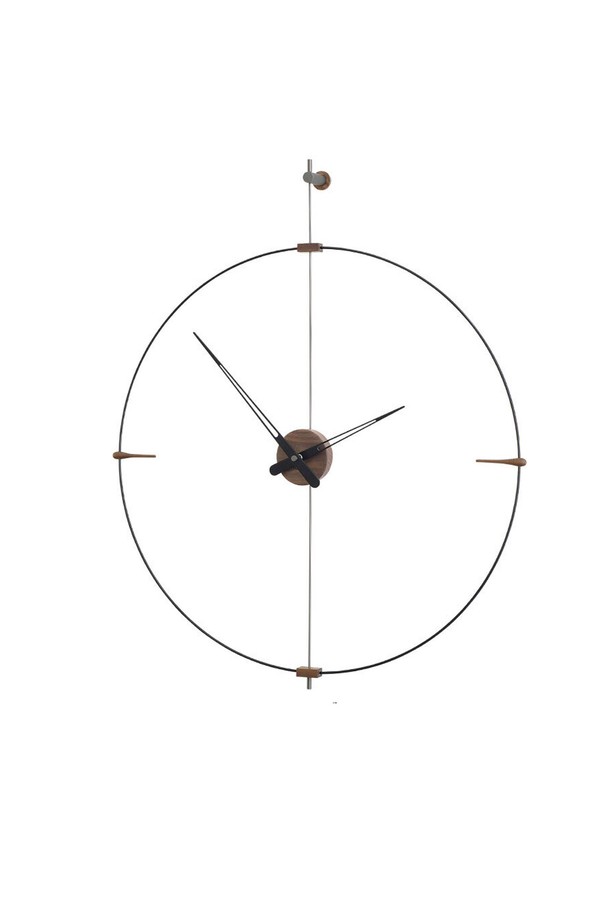 노몬(NOMON) 미니 빌바오 벽시계는 모던하고 심플한 스타일을 추구하는 분들을 위한 벽시계입니다. 블랙 컬러의 깔끔한 디자인에 유리 섬유와 호두나무 원목을 사용하여 고급스러움을 더했습니다. 스페인에서 핸드메이드 방식으로 제작되었으며, DIY 조립 방식으로 나만의 개성을 담아낼 수 있습니다. 독일 UTS 쿼츠 무브먼트를 탑재하여 정확한 시간을 제공합니다. 
