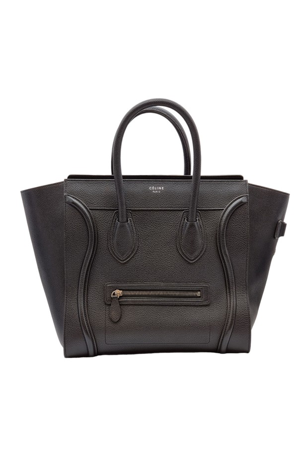 셀린느 브랜드의 라지 사이즈 러기지백 토트백입니다. 블랙 컬러의 가죽 소재로 제작되었으며, 무지 패턴의 사각 형태 디자인이 특징입니다. 럭셔리하고 클래식한 스타일을 연출하며, 일상에서 사용하기 좋은 여성용 브랜드백입니다.
