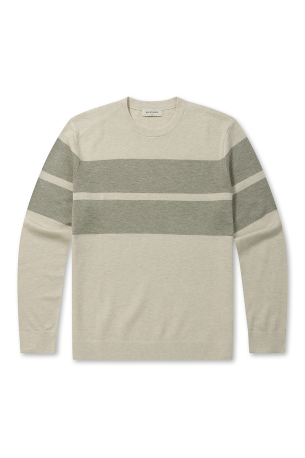 빅블록 워셔블 라운드넥 스웨터는 가을 나들이룩과 겨울 데일리룩에 잘 어울리는 베이직 스타일의 스웨터입니다. 부드러운 울 소재로 제작되어, 쌀쌀한 날씨에도 포근하고 편안한 착용감을 선사합니다. 베이지, 그린 두 가지 색상으로 출시되었으며, 핏은 레귤러핏, 네크라인은 라운드넥 디자인입니다. 이중 조직 디자인, 밑단 및 소매단의 립 처리, 좌측 옆선 로고 라벨이 특징이며 워셔블 기능으로 관리가 용이합니다. 긴소매 기장의 보통 두께 스웨터로, 클래식, 미니멀, 캐주얼 등 다양한 스타일을 연출할 수 있습니다.
