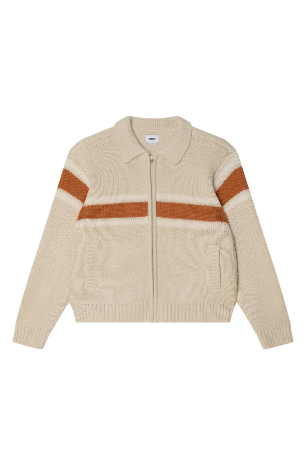 BERNARD ZIP UP SWEATER 버나드 집업 스웨터 - BIRCH MULTI는 부드러운 니트 소재의 여성 및 남성 공용 집업 스웨터입니다. 가을, 겨울 시즌에 어울리는 두꺼운 두께감과 하이넥 디자인으로 따뜻하게 착용할 수 있습니다. 베이지, 브라운 컬러의 배색 디자인과 크롭 기장으로 캐주얼하고 베이직한 스타일을 연출합니다. 레귤러핏으로 편안하게 착용 가능하며, 집콕룩이나 산책룩은 물론 미니멀한 스타일에도 잘 어울립니다.
