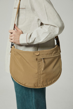 essential moon messenger bag