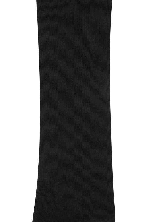 (W) 스트라이프 울 니삭스는 여성 골퍼 및 겨울 데일리룩을 위한 아이템입니다. 아이보리, 블랙 두 가지 색상으로 출시되었으며, 울 블렌드 소재로 제작되어 부드러운 촉감과 뛰어난 보온성을 자랑합니다. 발바닥 파일 편직과 프리미엄 니트 구조로 편안한 착용감을 선사하며, 무릎 길이로 다리 전체를 따뜻하게 감싸줍니다. 클래식, 미니멀, 캐주얼 스타일 모두에 잘 어울리며, 곰 자수와 곰 로고 자카드 디자인이 포인트로 더해져 세련된 분위기를 연출합니다.
