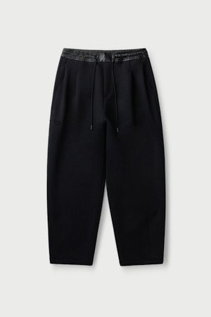 Souplesse 루즈 캐롯핏 팬츠