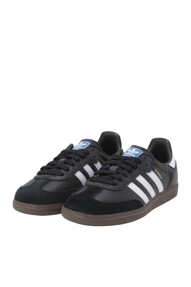 삼바 OG - 코어 블랙 / 클라우드 화이트 / 검(Samba OG - Core Black / Cloud White / Gum)은 여성 고객을 위한 신발입니다. 일상과 캐주얼 스타일에 적합하며, 사계절 내내 착용할 수 있습니다. 라운드 앞코 디자인에 레더(leather) 소재를 사용하여 클래식하면서도 미니멀한 느낌을 줍니다. 레이스(lace) 여밈과 로우탑 디자인으로 편안한 착용감을 제공하며, 동네 마실룩과 산책룩에 잘 어울립니다.
