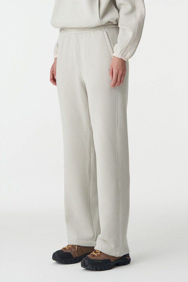 코오롱스포츠-의류 하의-여성 루즈핏 밴딩 팬츠 (SET-UP)