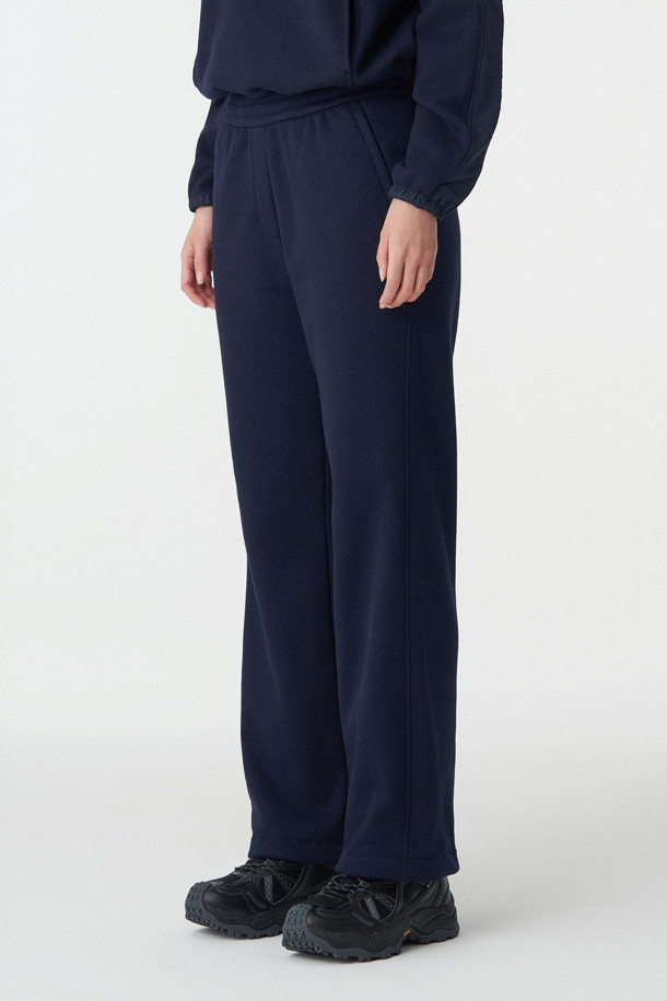 코오롱스포츠-의류 하의-여성 루즈핏 밴딩 팬츠 (SET-UP)