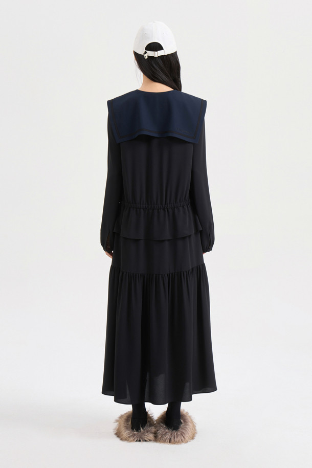 세일러 카라 롱 드레스 (블랙)는 클래식하고 캐주얼한 무드를 동시에 연출하는 여성 롱 원피스입니다. 부드러운 폴리에스터 소재로 제작되어 편안한 착용감을 선사하며, 사계절 내내 활용 가능합니다. A라인 핏에 롱 기장으로 우아함을 더하고, 셔링과 프릴 단, 테이프 장식, 레터링 자수 디테일이 돋보입니다. 구김이 적어 관리가 용이하며, 데이트룩, 카페룩 등 다양한 TPO에 잘 어울리는 웨어러블한 디자인입니다. 루즈핏으로 편안하게 즐길 수 있는 블랙 컬러의 무지 원피스입니다.
