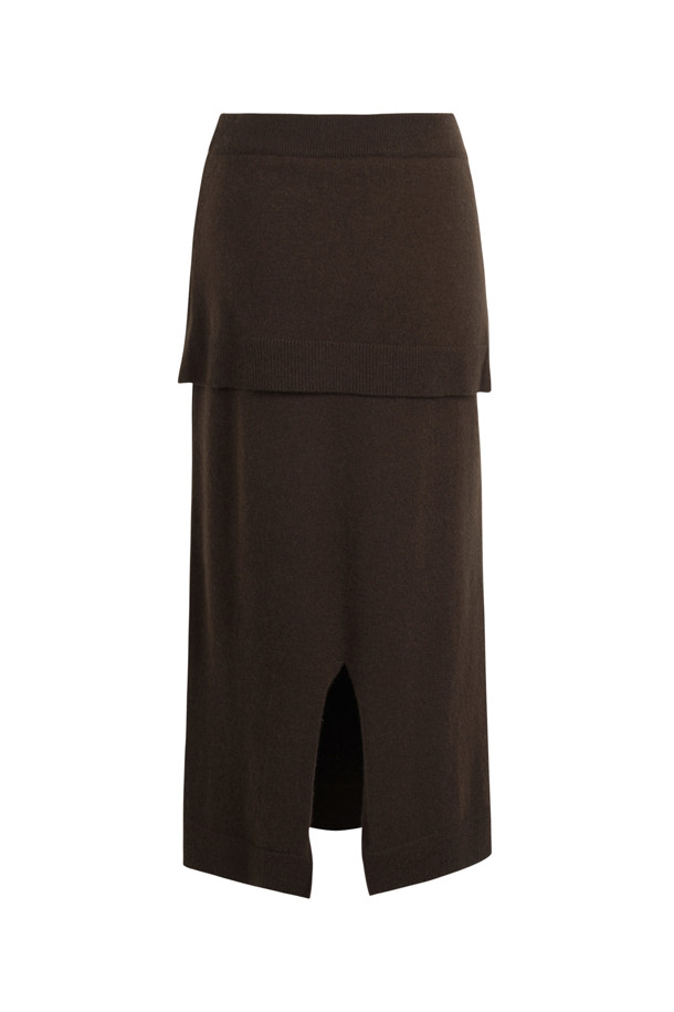 몽골산 캐시미어 100% 소재의 Tie-waist 스커트(브라운)입니다. H라인 핏으로 미니멀하고 클래식한 분위기를 연출하며, 부드러운 촉감과 두꺼운 두께로 겨울철에도 따뜻하게 착용할 수 있습니다. 랩 스타일의 디자인에 스카프 패널과 매듭 디테일이 더해져 세련된 포인트를 줍니다. 뒷트임이 있어 활동성을 높였으며, 오피스룩, 모임룩, 데이트룩 등 다양한 TPO에 활용 가능합니다. 시크한 스타일을 선호하는 여성분들께 추천합니다.
