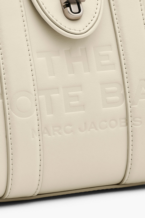 MARC JACOBS - 크로스백 - Leather Turnlock The Crossbody Tote_Cloud white (2F4HCR015H04-123)