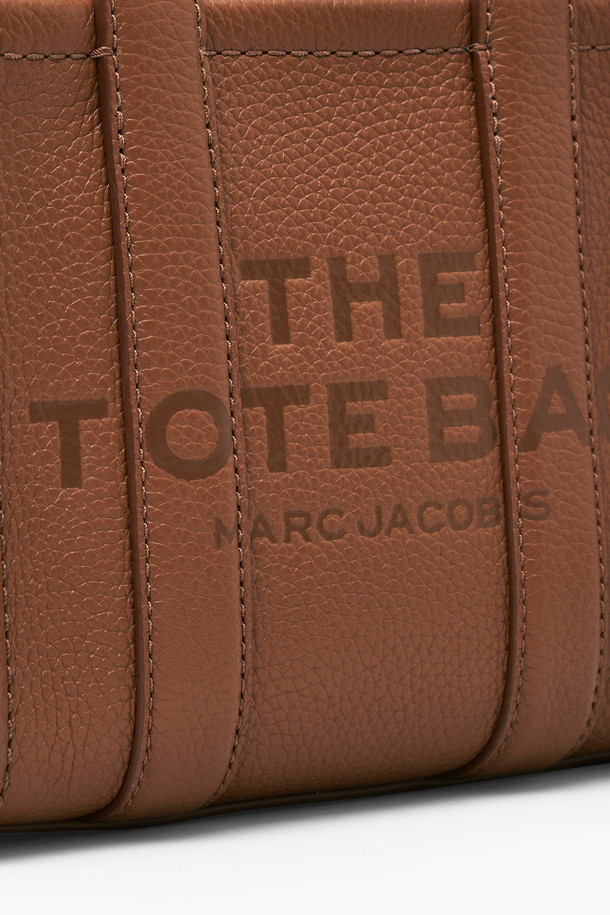 MARC JACOBS - 토트백 - Leather The Crossbody Tote_Argan Oil (H053L01RE22-212)