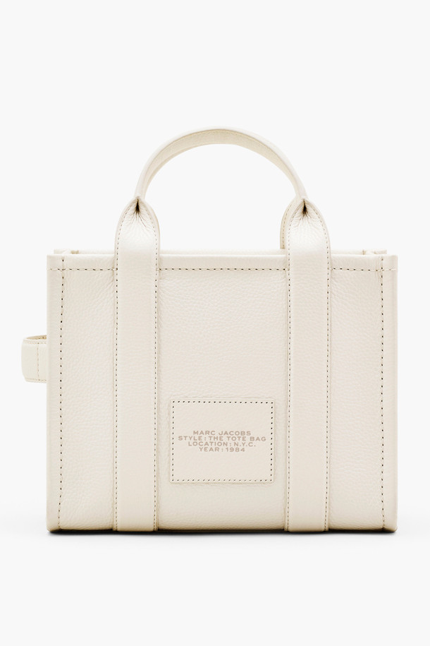 MARC JACOBS - 토트백 - Leather The Small Tote_COTTON/SILVER (H009L01SP21-140)