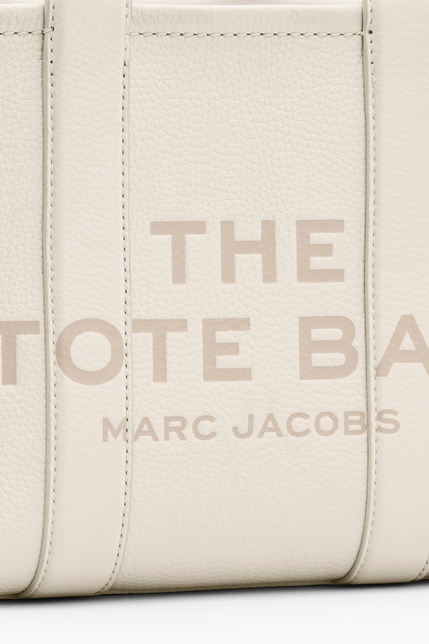 MARC JACOBS - 토트백 - Leather The Small Tote_COTTON/SILVER (H009L01SP21-140)