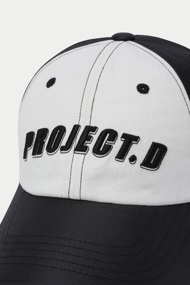 series - Initial-D(이니셜 D) Project D(프로젝트 D) 로고 캡은, 블랙과 화이트 두 가지 색상으로 출시되어 다양한 스타일에 매치하기 용이한 볼캡입니다. PROJECT.D(프로젝트 D) 로고 자수 디테일이 돋보이며, 은은한 광택감이 고급스러운 느낌을 더합니다. 캐주얼, 미니멀, 스트리트 스타일을 즐겨 입는 분들께 추천드리며, 가볍게 동네 마실룩이나 산책룩을 연출하기 좋습니다. 봄, 여름, 가을, 세 계절 모두 착용 가능한 실용적인 아이템입니다.
